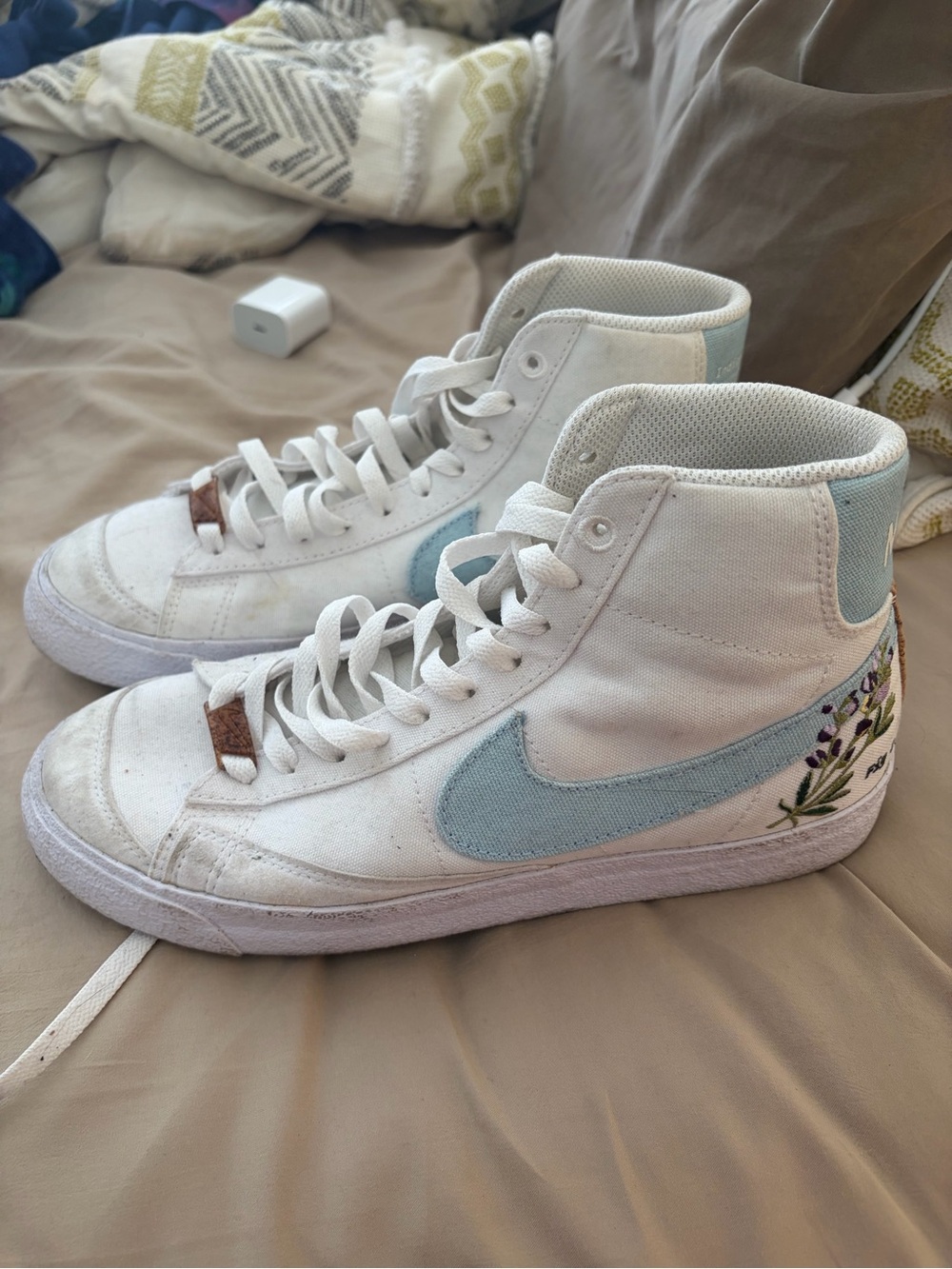 Nike White High-Top Sneakers with Light Blue Swoosh and Floral Embroidery